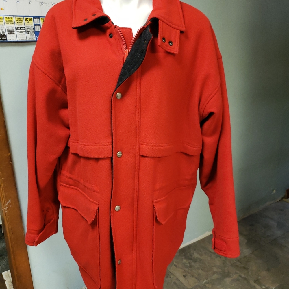 Vintage woolrich red wool coat. Womens size L-XL. Wool plaid lined.